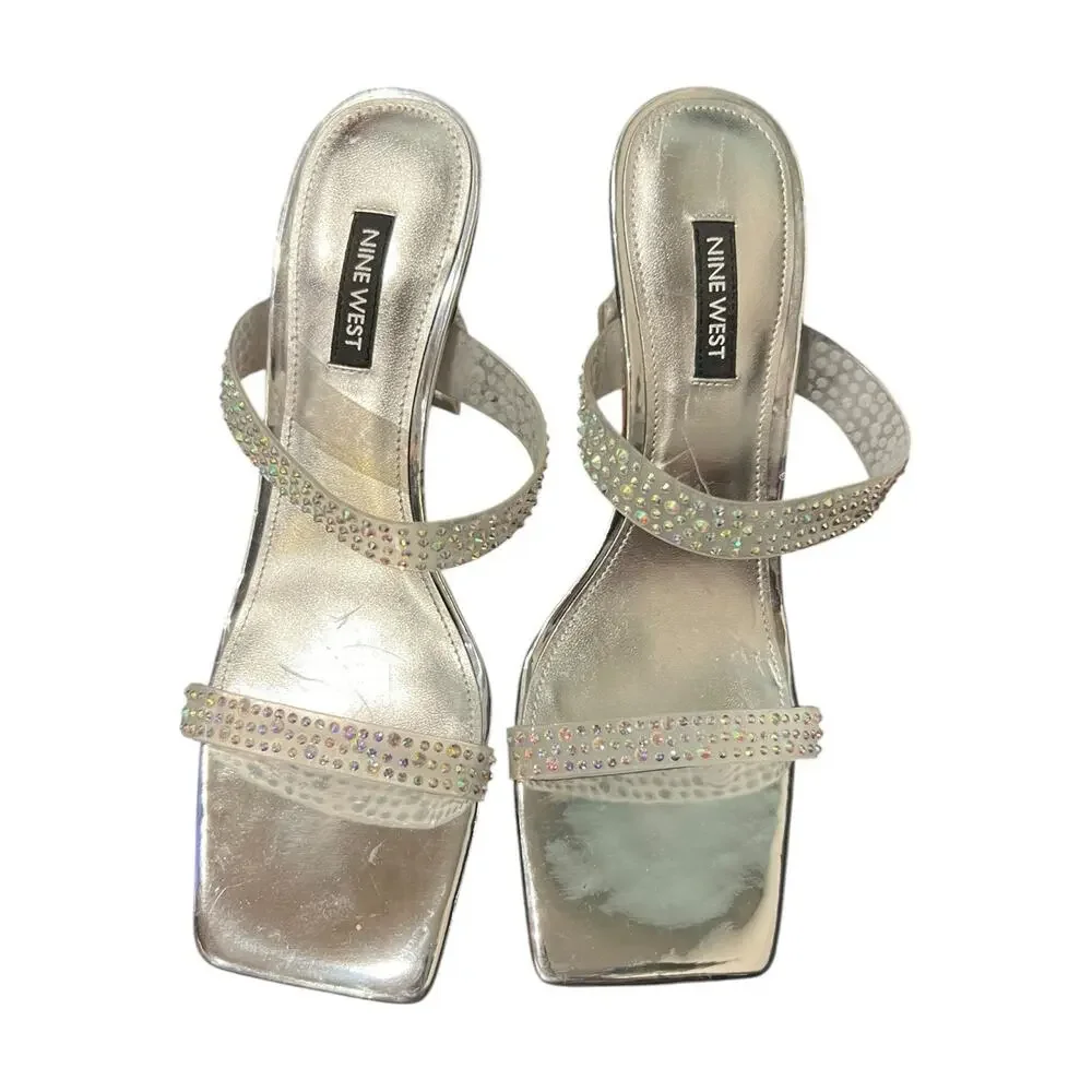 Nine West Yogirl sandals feature a metallic silver shimmer Women’s 8